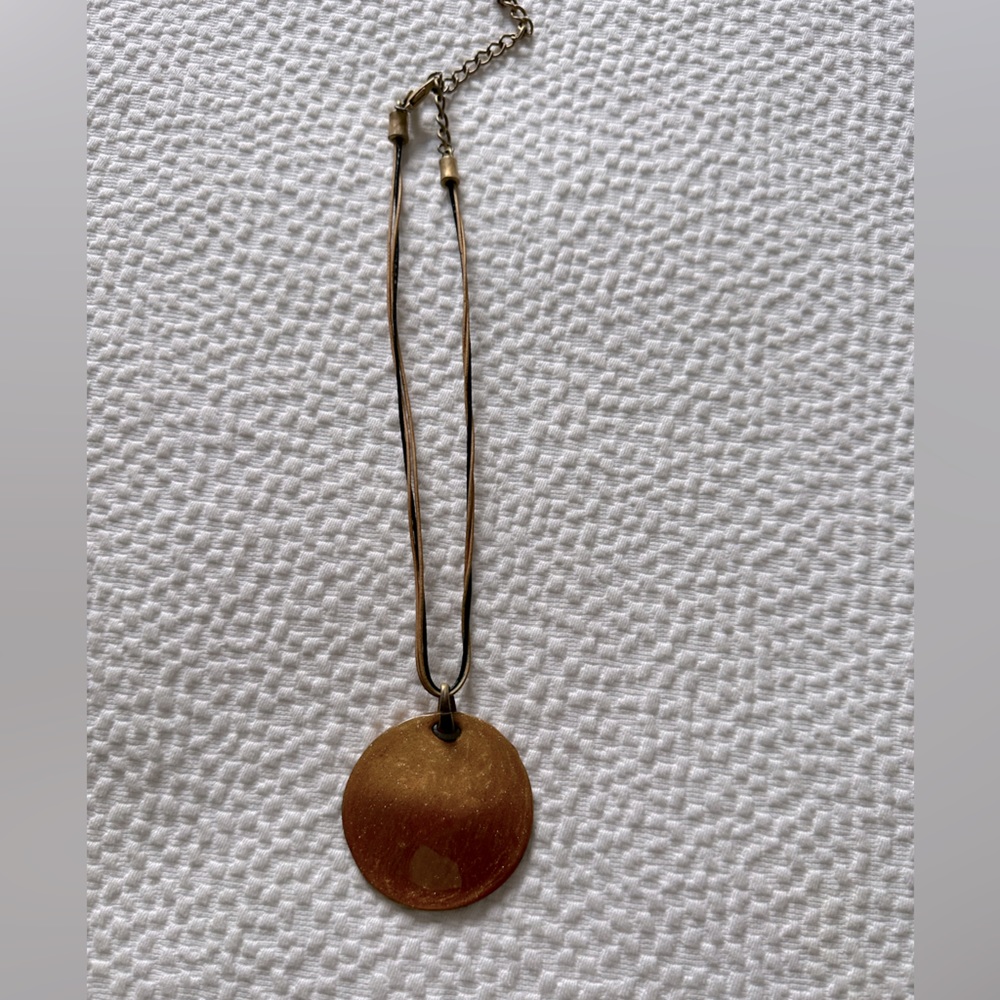 Vintage gold disc necklace with leather strings